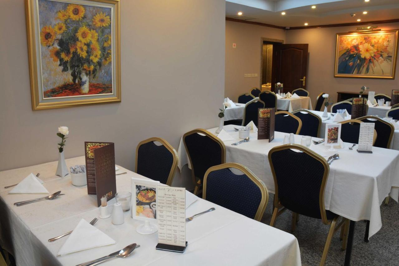 Capri Hotel Suites Amman Bagian luar foto